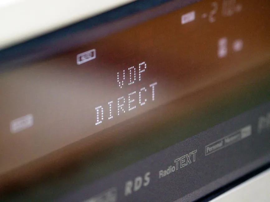 Extreme close-up of an electronic screen showing 'VDP DIRECT' in bold letters.